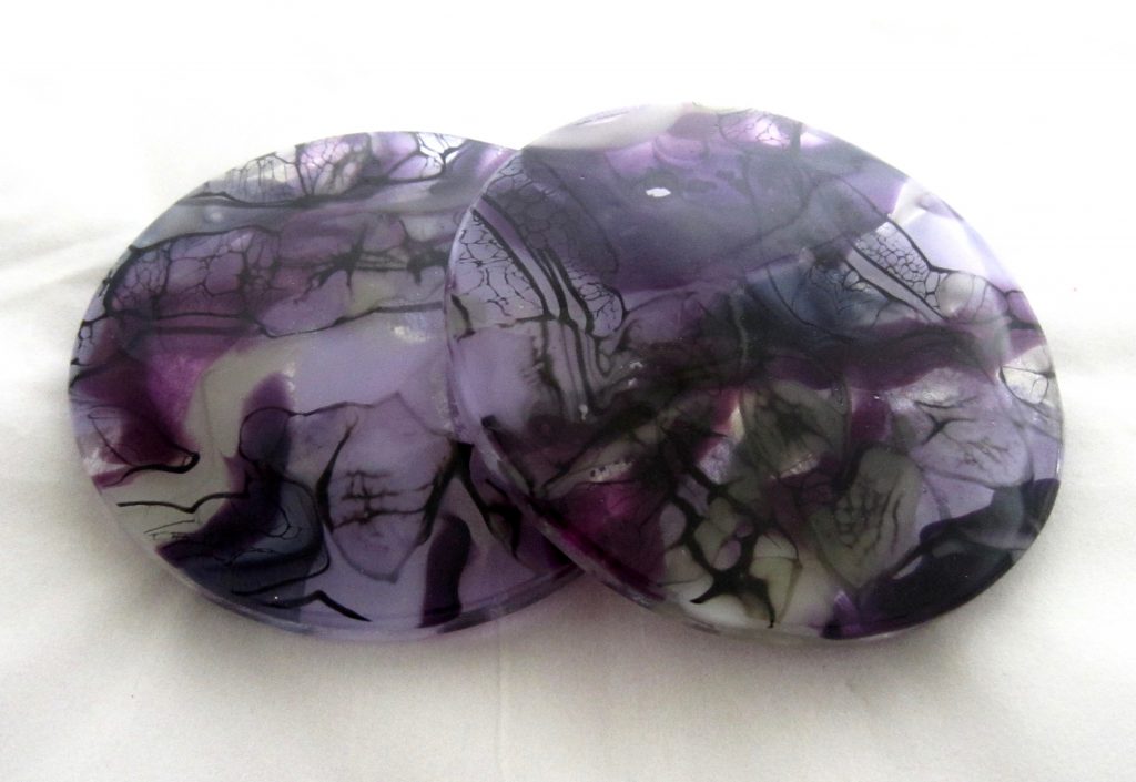 Caron Art Glass fused glass table ware coasters Astro Hotel hand raked glass purple black gray round