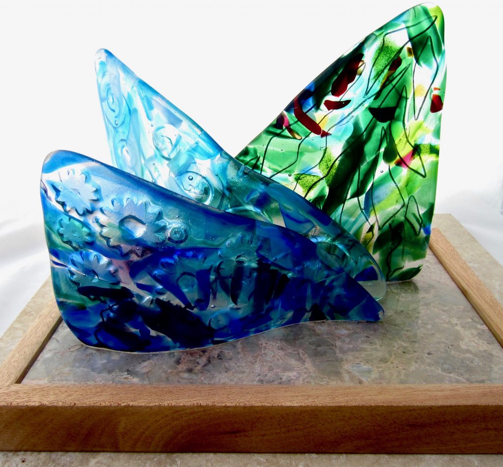 Caron Art Glass fused glass sculpture virtual art sale home decor Hoe A Mau - Gazing At Stars hand raked glass kiln carved design blue green turquoise 3 elements triangle marble wood base