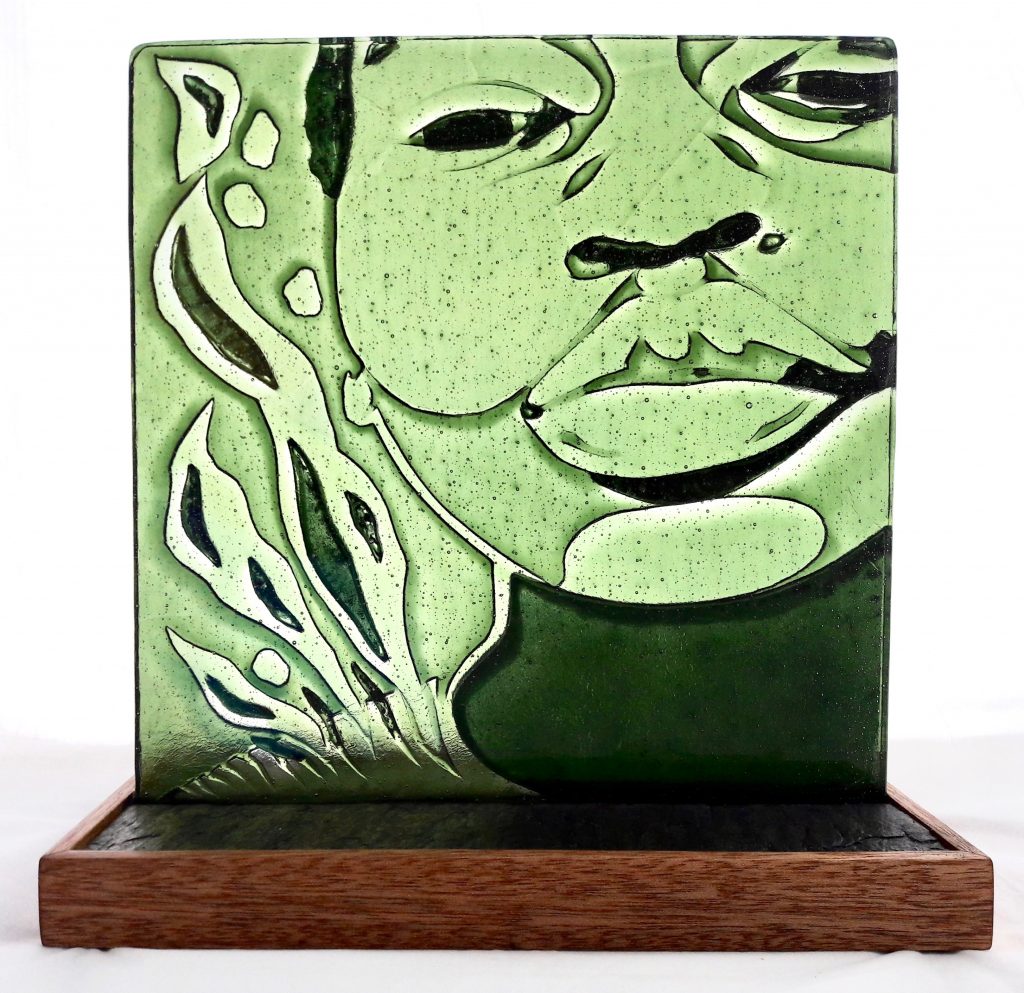 Caron Art Glass fused glass sculpture portrait la femme au vert olive kiln carved glass olive green square slate wood base