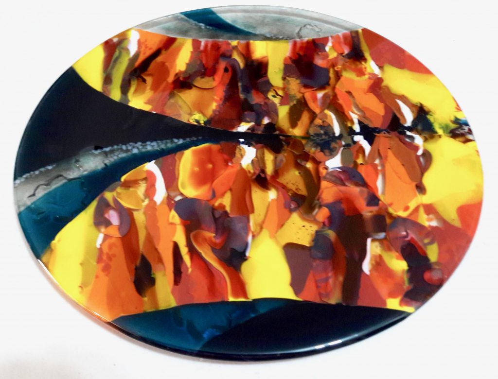 Caron Art Glass fused glass table ware platter Portland Fall hand raked glass landscape trees river red orange yellow brown sea blue gray round