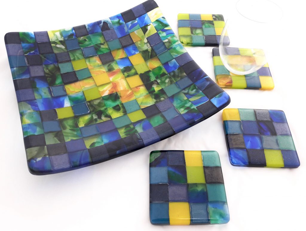 Caron Art Glass fused glass table ware set platter coasters Ulana hand raked glass weave blue green yellow square