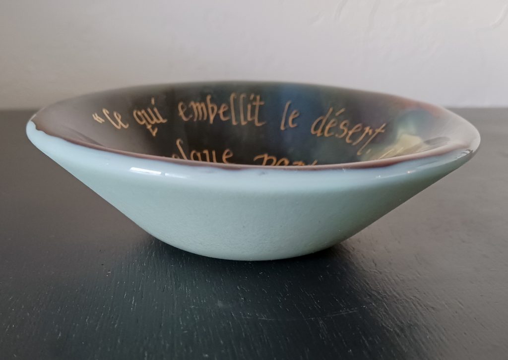 Caron Art Glass Michelle Caron fused glass gray brown red robin's egg blue Antoine de Saint-Éxupéry quote French small bowl Blessing Bowl side view