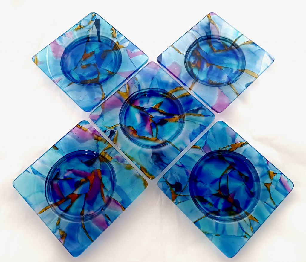 Caron Art Glass / art glass tableware / wine bottle coasters / Deep Sea / hand raked fused glass / blue, aqua, purple, amber / sqaure