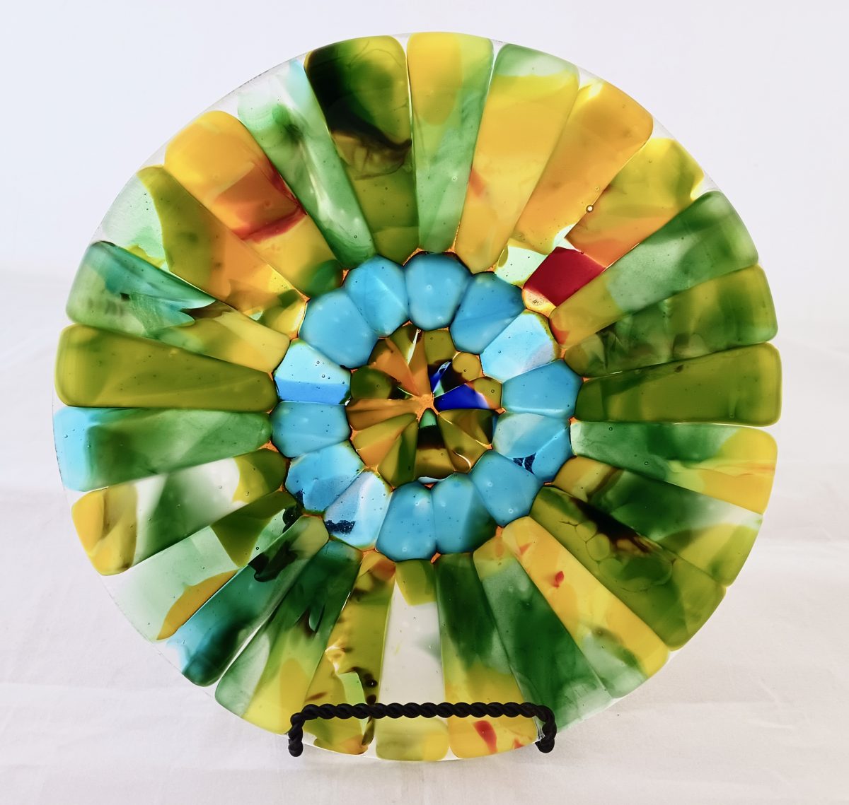 Caron Art Glass Michelle Caron fused glass hand raked glass plate zinnia amber green turquoise round